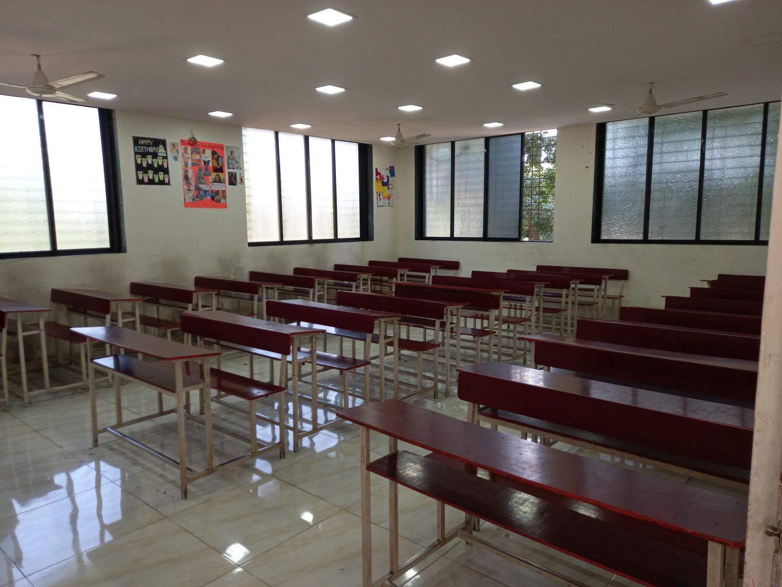 Lecture hall with bench seating at MHWS Borivali