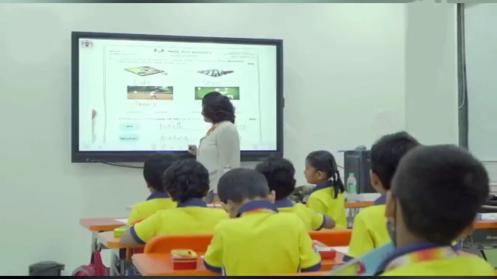 A lesson in progress on the interactive smart board at MHWS, Borivali